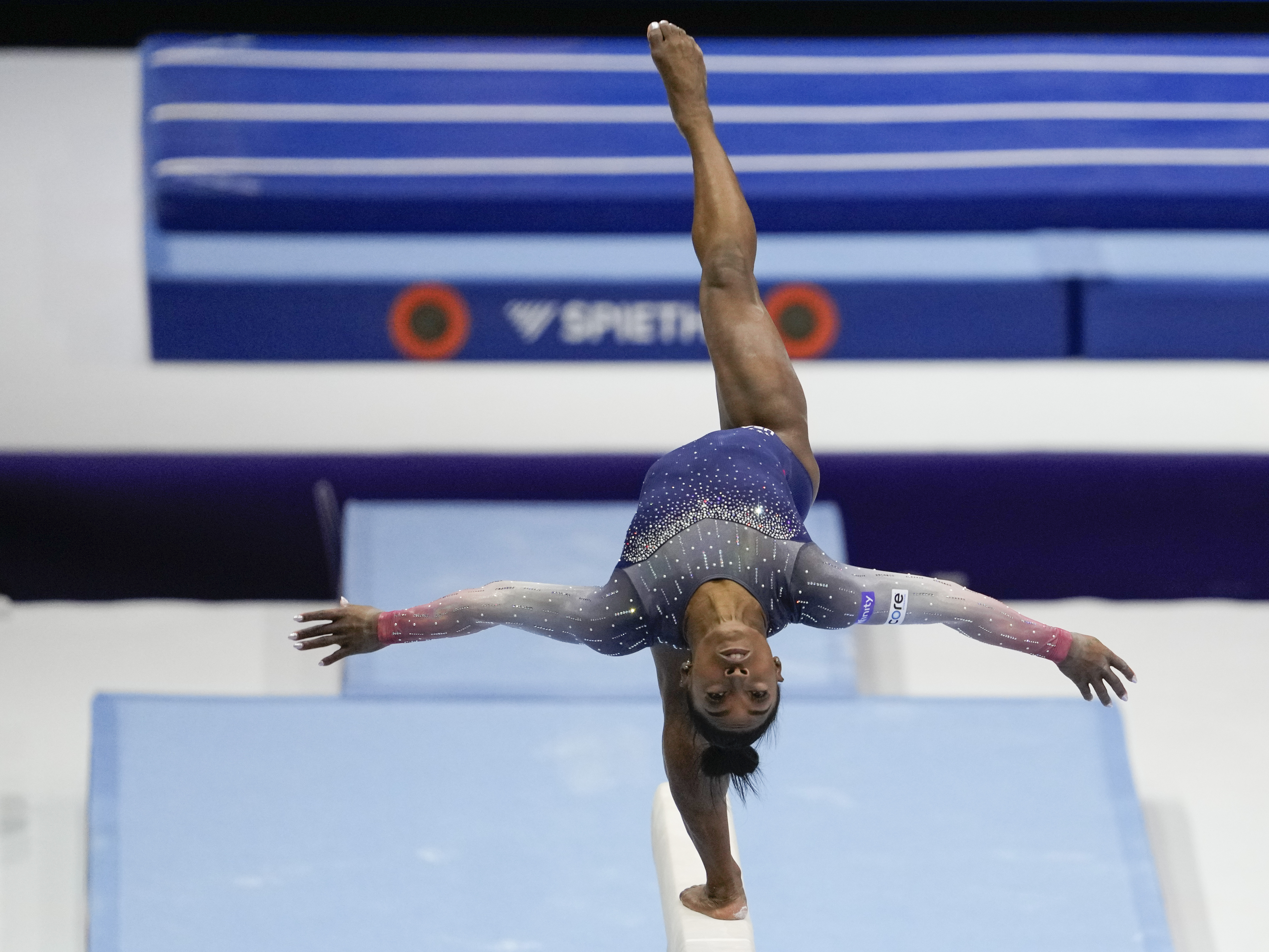 caption: Simone Biles of the United States competes on the beam during the women's team final at the Artistic Gymnastics World Championships in Antwerp, Belgium, on Wednesday.
