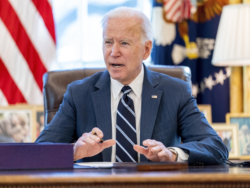 caption: The advance child tax credit program is part of the Biden administration's $1.9 trillion economic aid package called the American Rescue Plan that was passed in March.