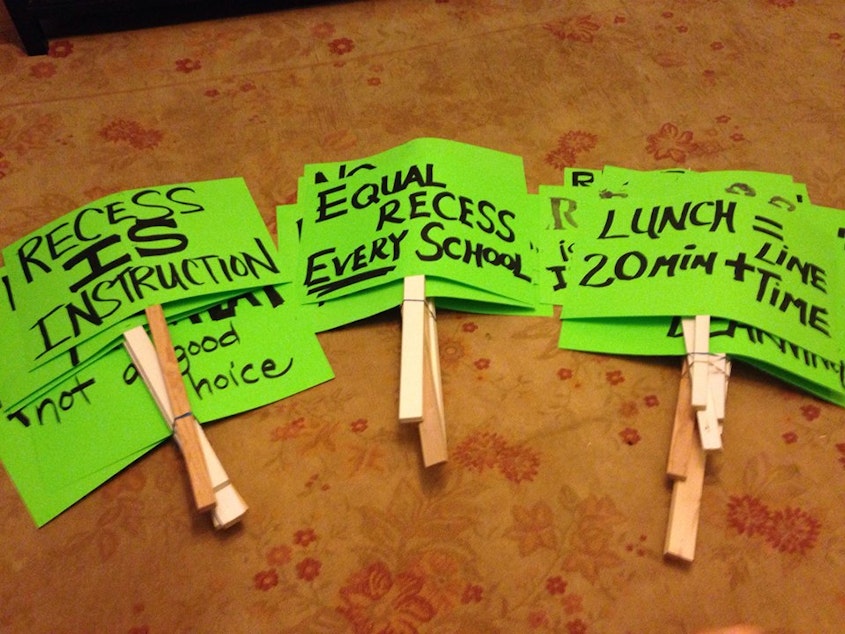 caption: Signs promote lunch and recess for Seattle students.