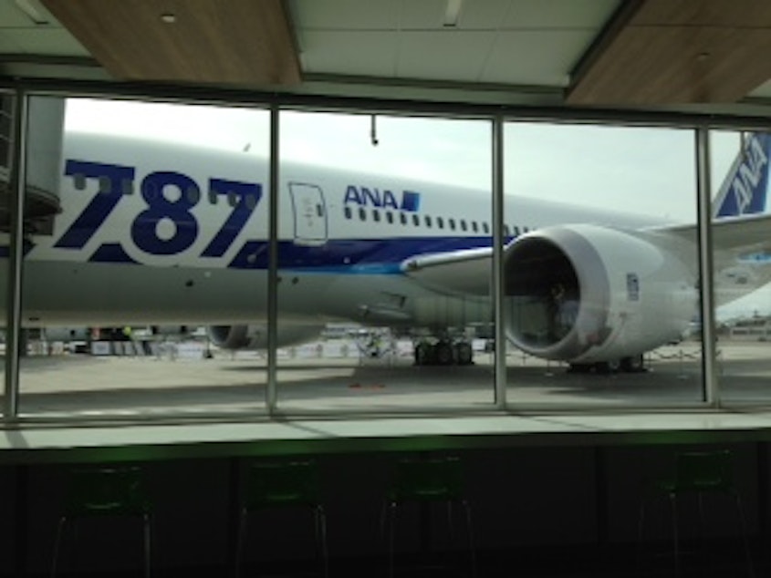 caption: During the 2013 battery crisis, a 787 parked at Boeing's Everett delivery center, waiting for FAA certification