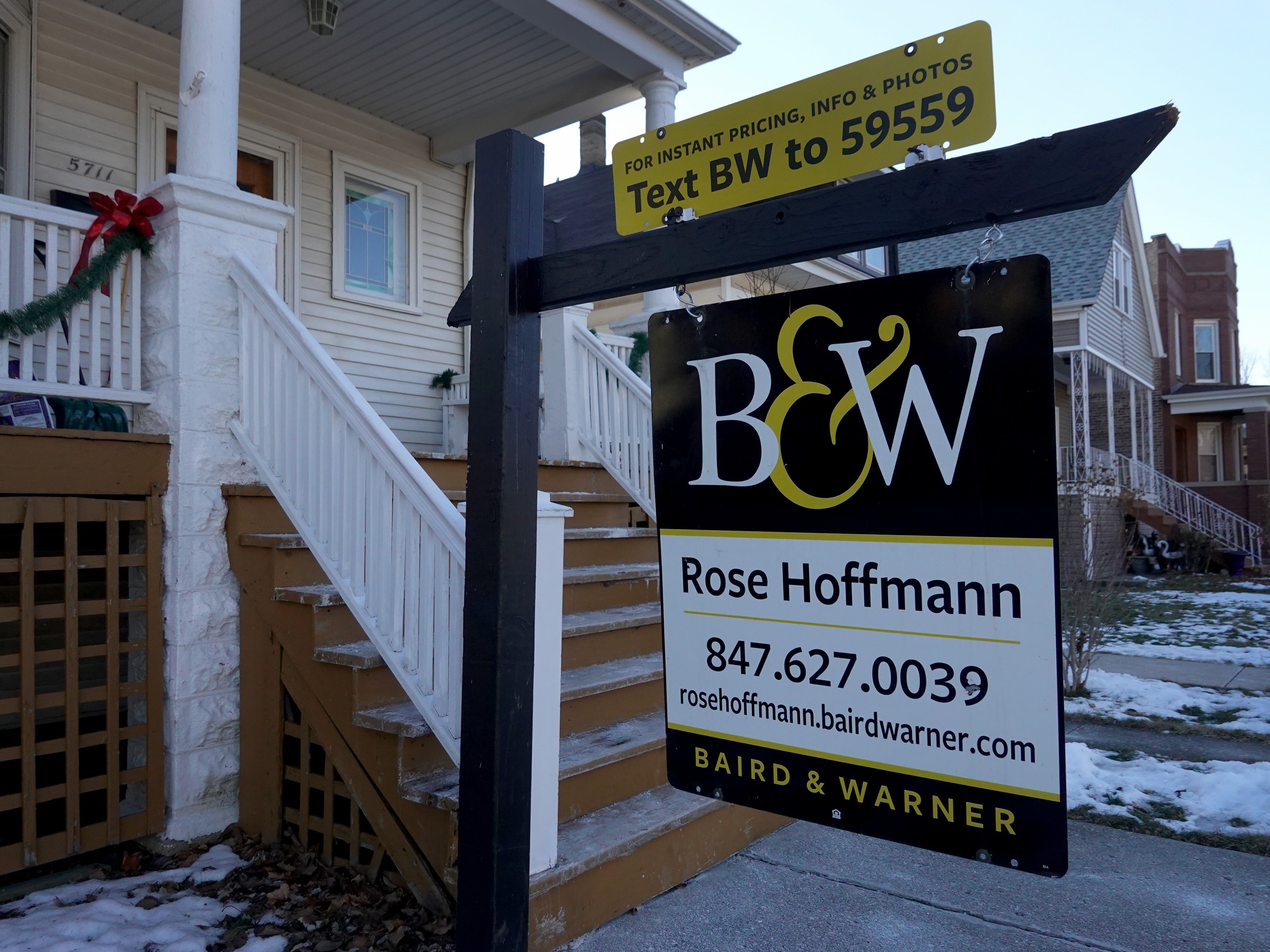 caption: High prices and high mortgage rates are making it hard for many people to get a toehold in the housing market. A new report from the National Association of Realtors says the share of homes sold to first-time buyers dropped to a record low in the last year.