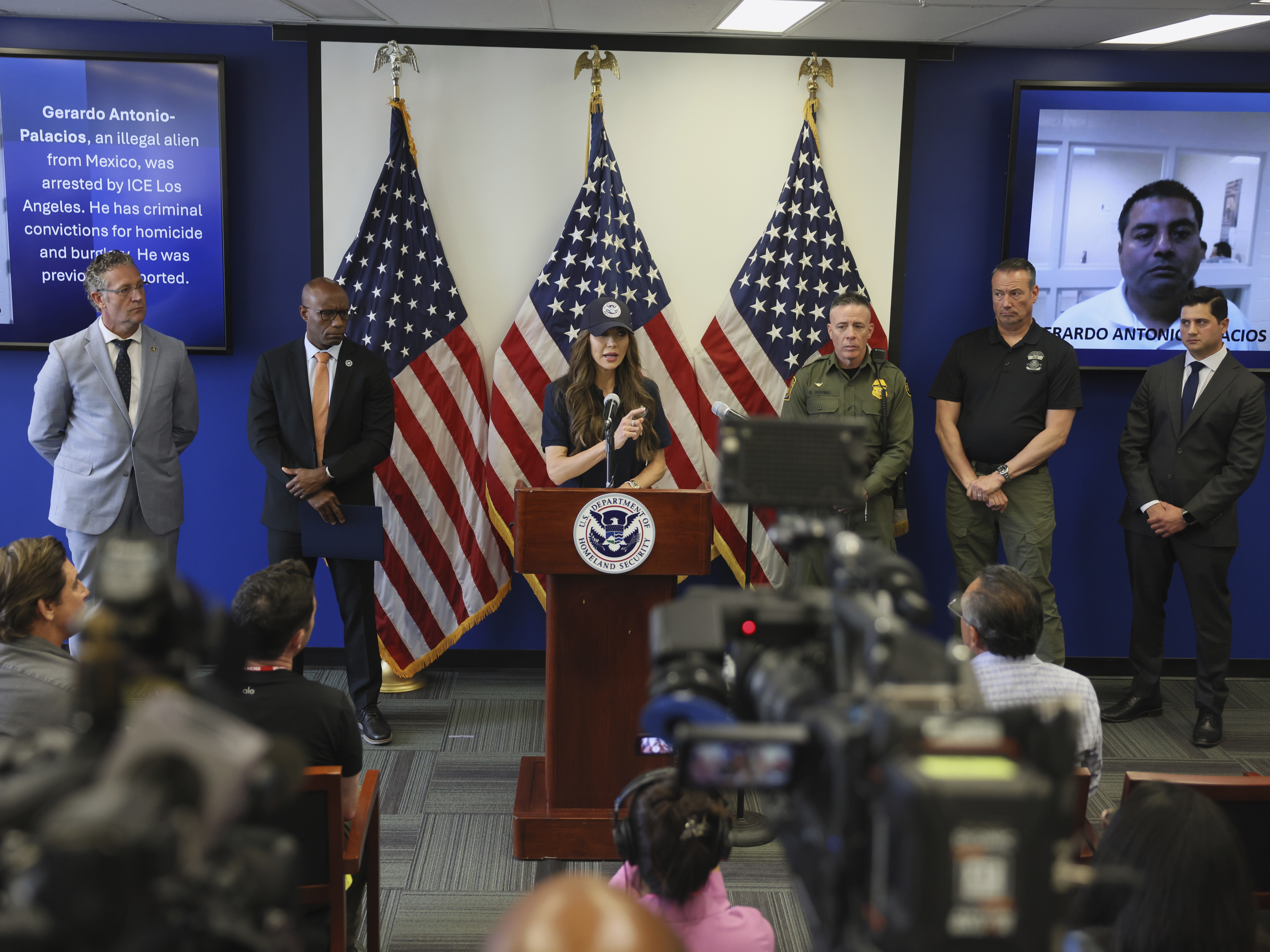 caption: Secretary of Homeland Security  Kristi Noem held a news conference in Los Angeles on Thursday. She vowed to continue the immigration raids that have led to days of protests in the city and accusations that the Trump Administration is abusing its power.