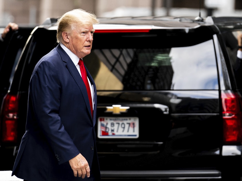 caption: Former President Donald Trump departs Trump Tower, Wednesday, Aug. 10, 2022, in New York, on his way to the New York attorney general's office for a deposition in a civil investigation.