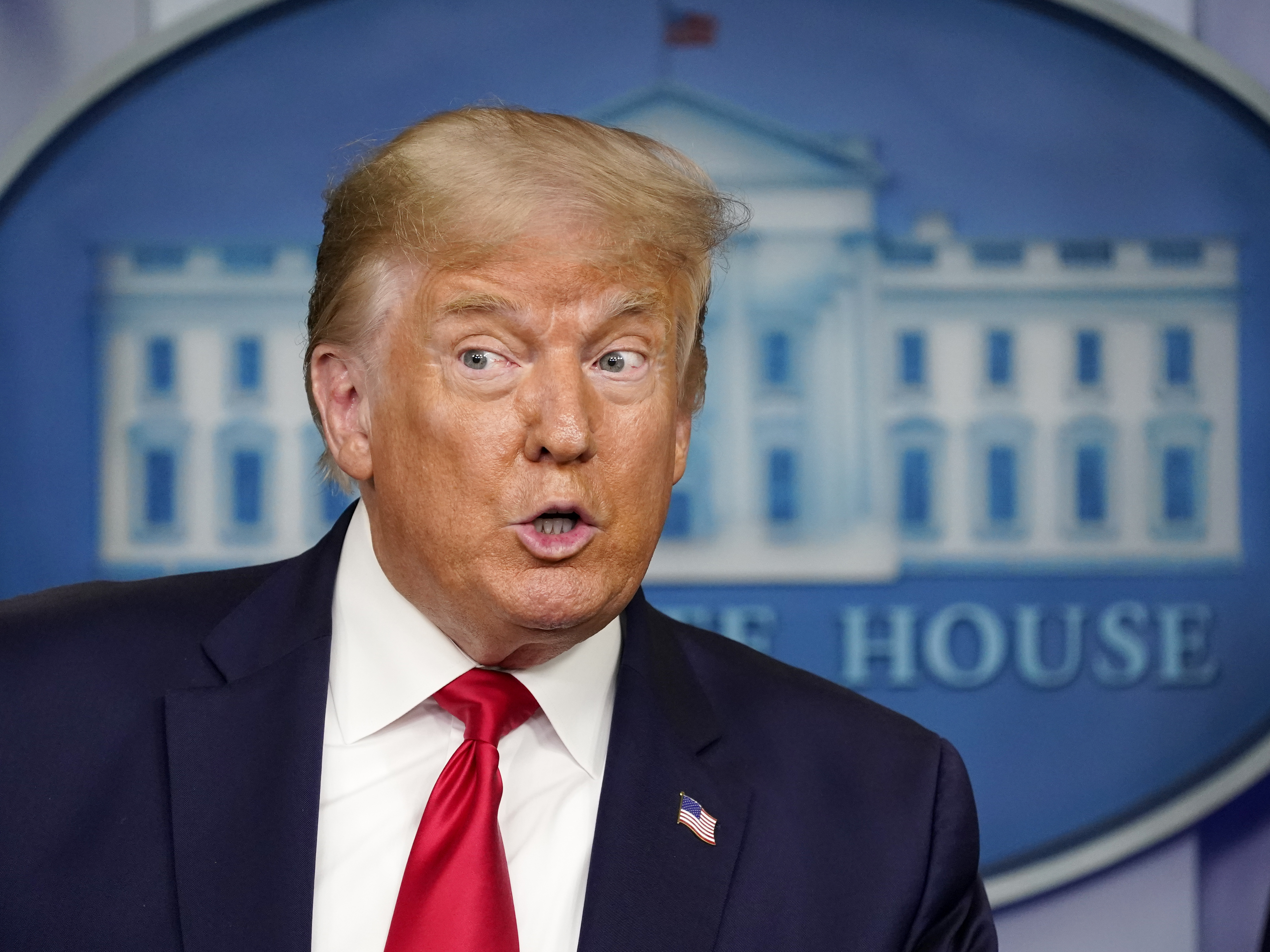 caption: President Trump's amplification of a false "birther" conspiracy against Sen. Kamala Harris has been criticized.