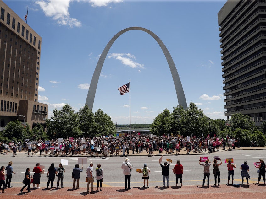 caption: Abortion rights supporters take part in a protest Thursday in St. Louis. A state license that allows a Planned Parenthood health center in Missouri to perform abortions could soon expire.