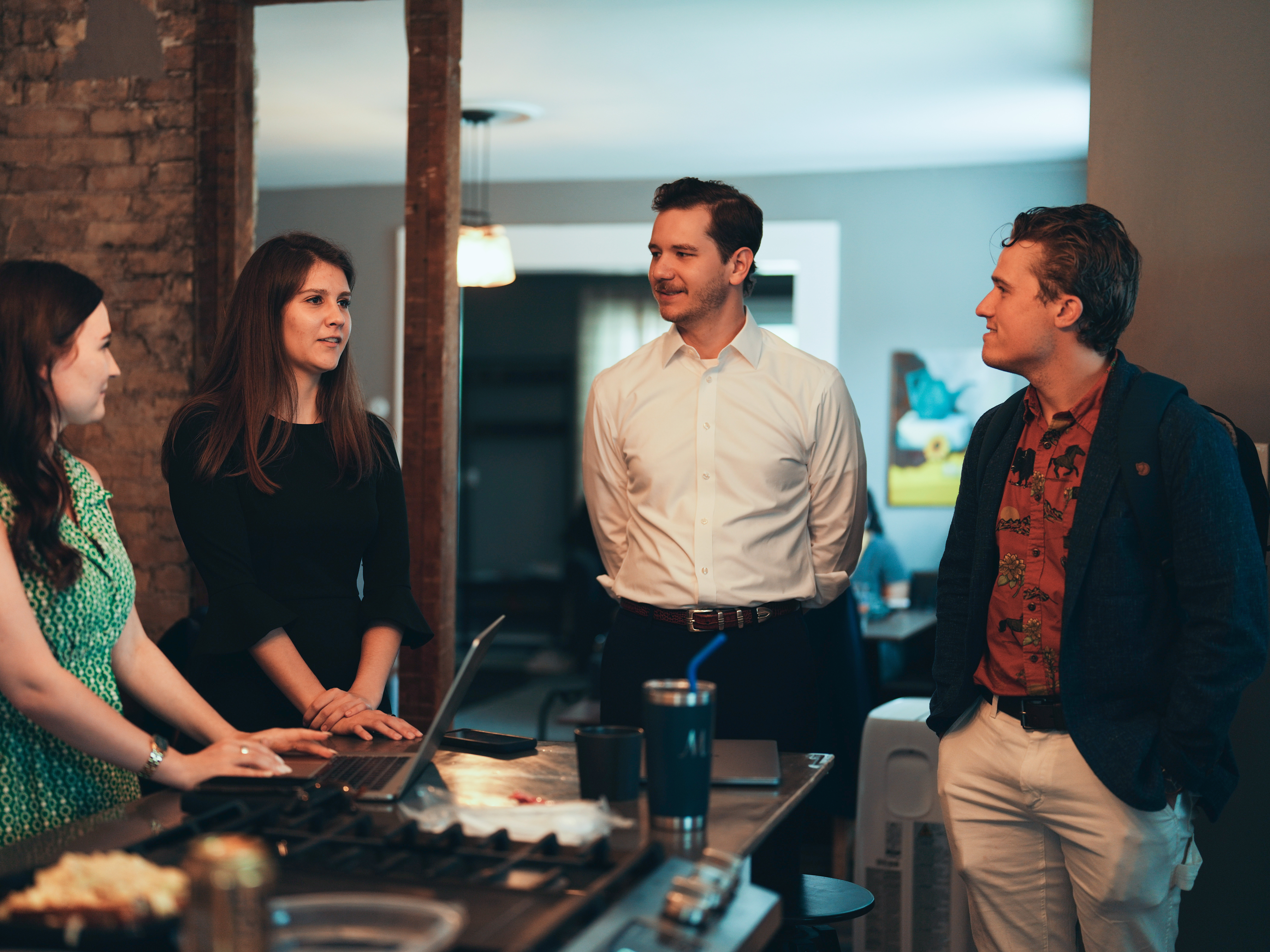 caption: Left to right: Danielle Butcher Franz, Karly Matthews, Stephen Perkins and Benji Backer talking about plans for the second day of the Republican National Convention in Milwaukee, Wisconsin.