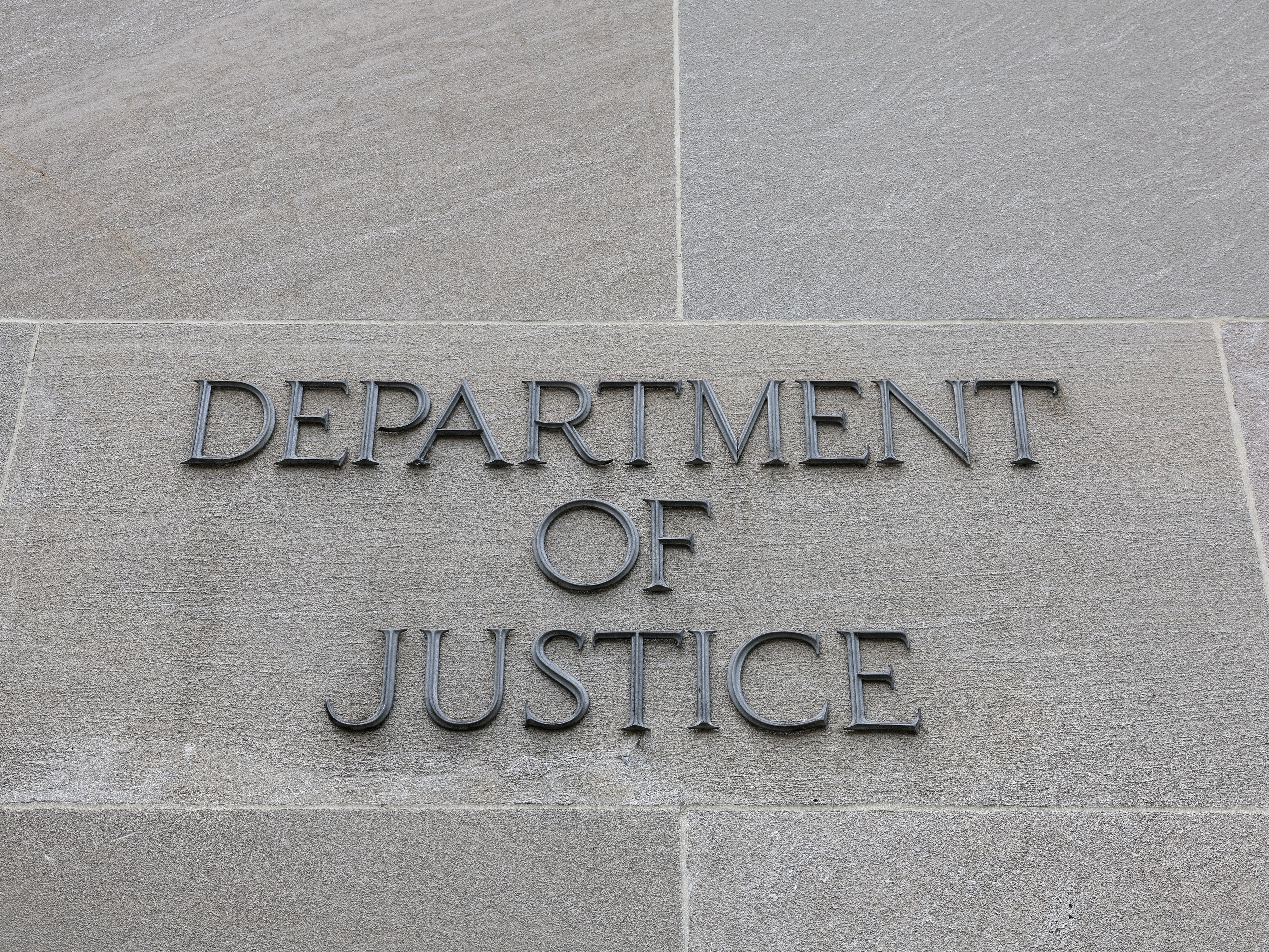 caption: The U.S. Department of Justice is seen on June 20, 2023 in Washington, D.C. At least 12 officials who worked with the special counsel Jack Smith to investigate President Trump have been fired from the department.