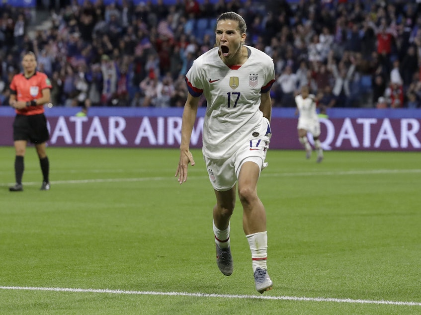 caption: United States' Tobin Heath celebrates after scoring her team's second goal during the Women's World Cup in Le Havre, France, Thursday.