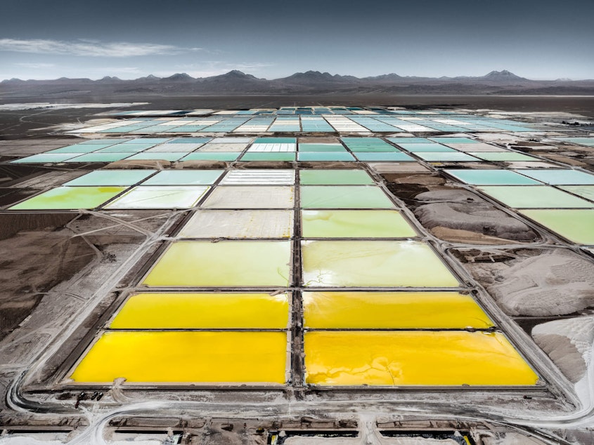 caption: Researchers at the Pacific Northwest National Laboratory say their nanoparticle technology can produce lithium cheaper and faster than typical methods, such as these lithium evaporation ponds at SQM Lithium in Chile's Atacama Desert.