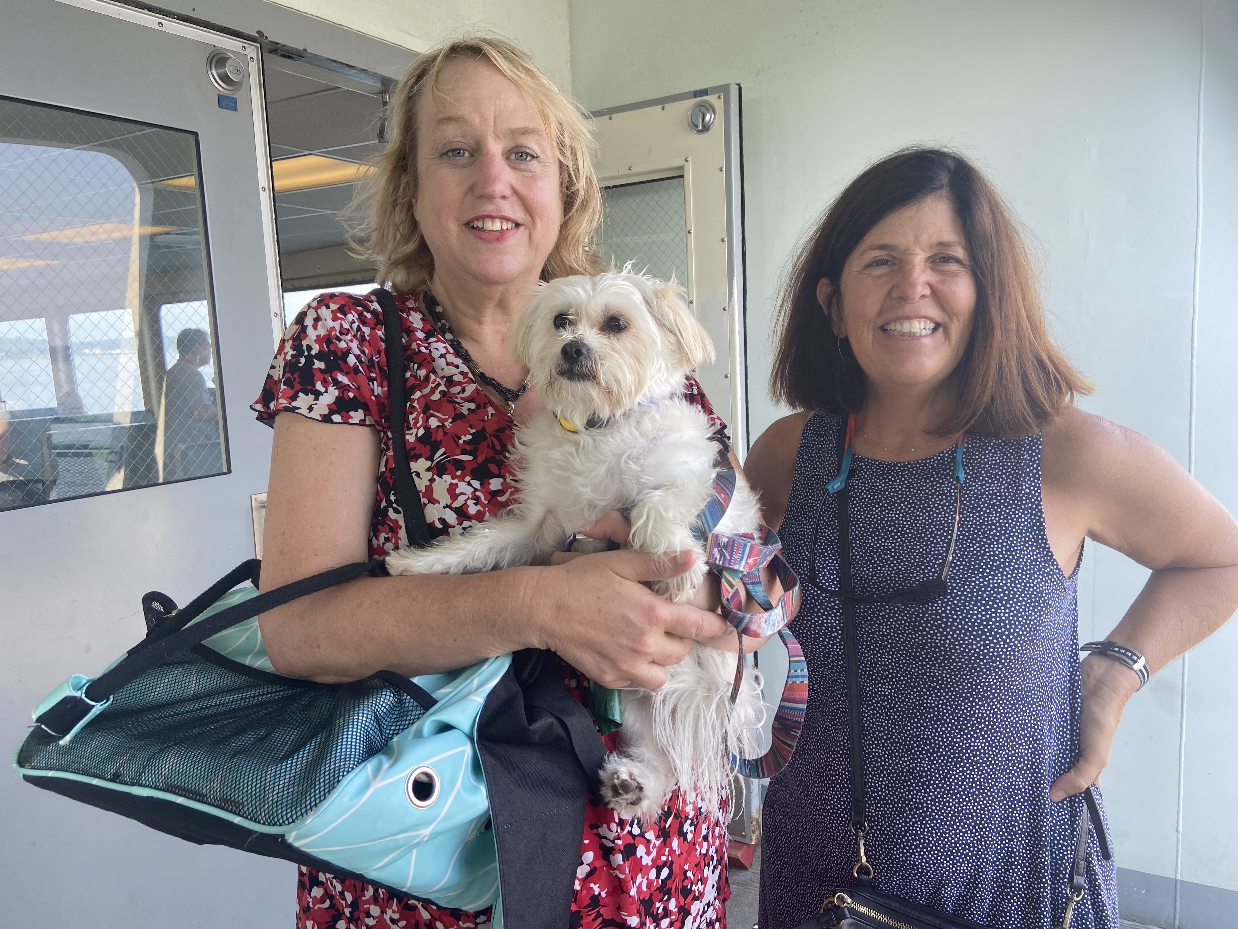 caption: Heidi Geiger (left) her dog Watson, and friend Beth Rahaim (right) tested the new ferry pet policy on Aug. 28, 2025.