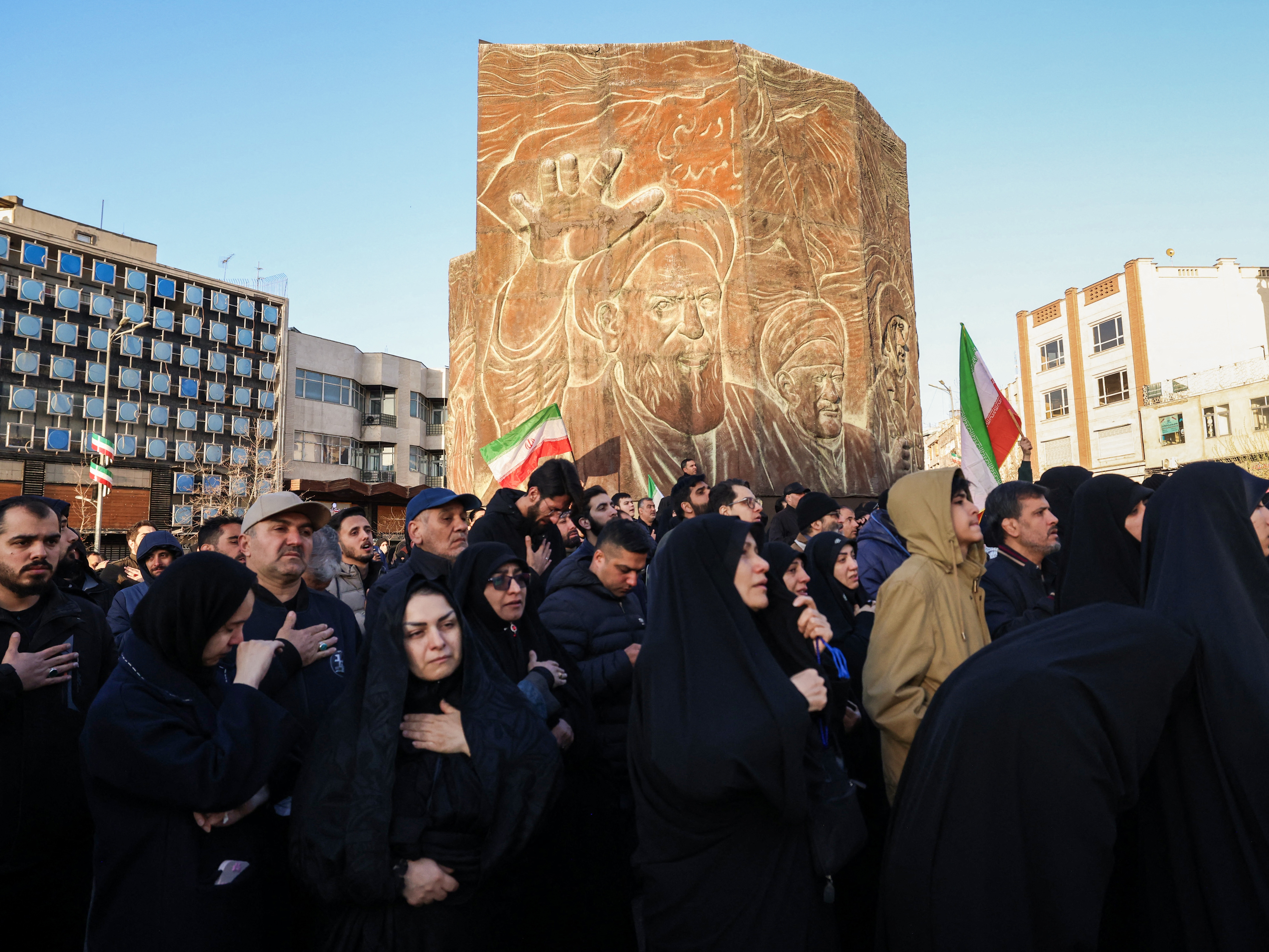 caption: People mourn the death of Iran's supreme leader Ayatollah Ali Khamenei, who was killed in joint US and Israeli strikes, at a square in Tehran on March 1, 2026. Ayatollah Ali Khamenei, Iran's supreme leader since 1989 and sworn enemy of the West, was killed in the opening salvo of a massive US and Israeli attack that extended into a second day on March 1, as the two powers seek to topple the Islamic republic.