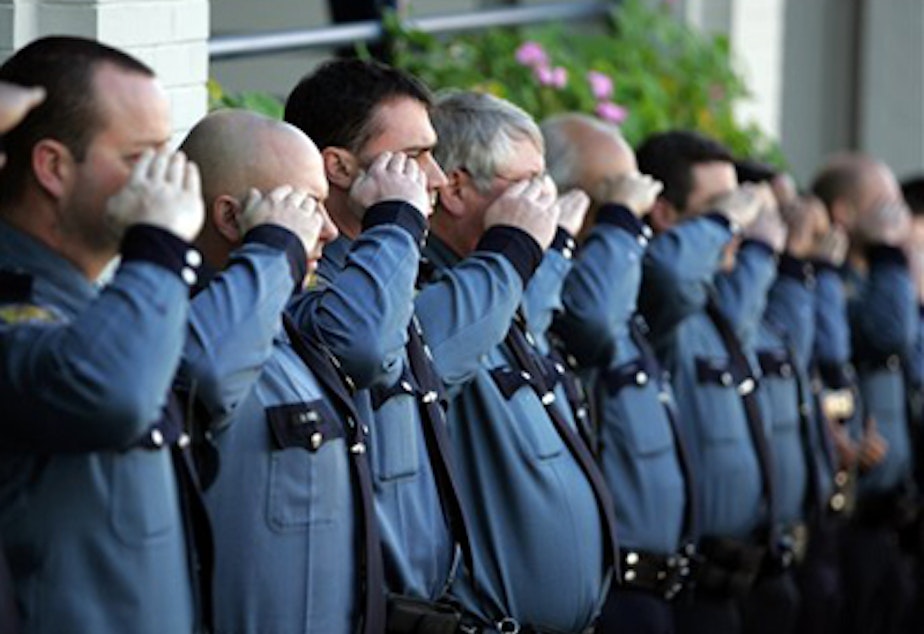 caption: File: Seattle Police Officers