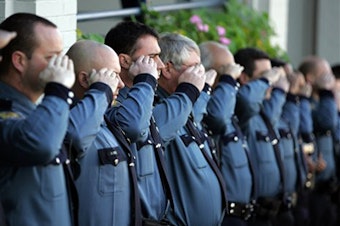 caption: File: Seattle Police Officers