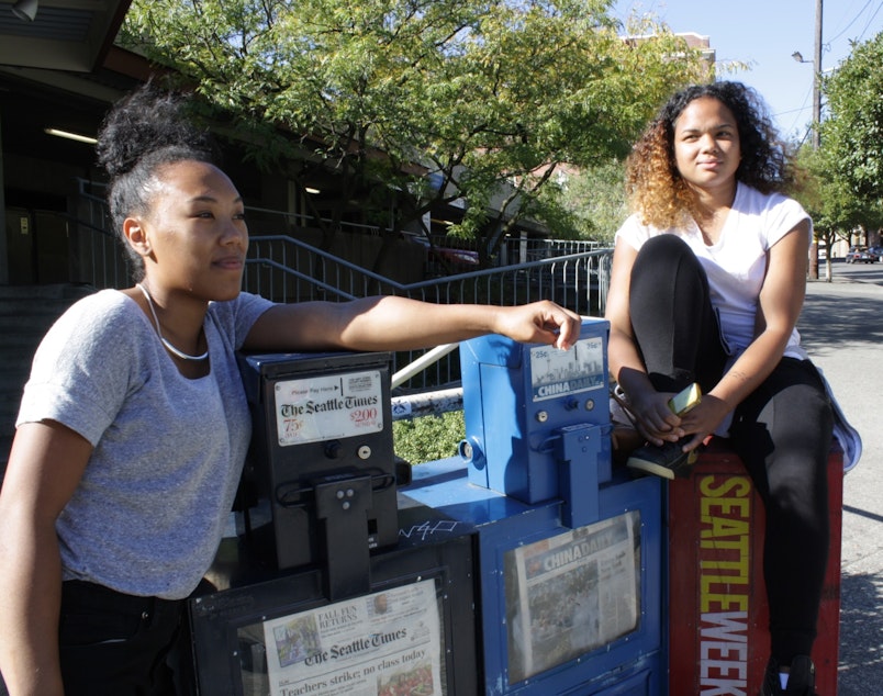 caption: Cousins Tiara Jinka and Tiana Jordan can't afford to live in Seattle.