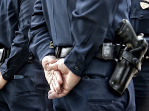 caption: Critics say American officers should be trained in defensive tactics, especially empty-hand techniques, so that they depend  less on tasers and guns.