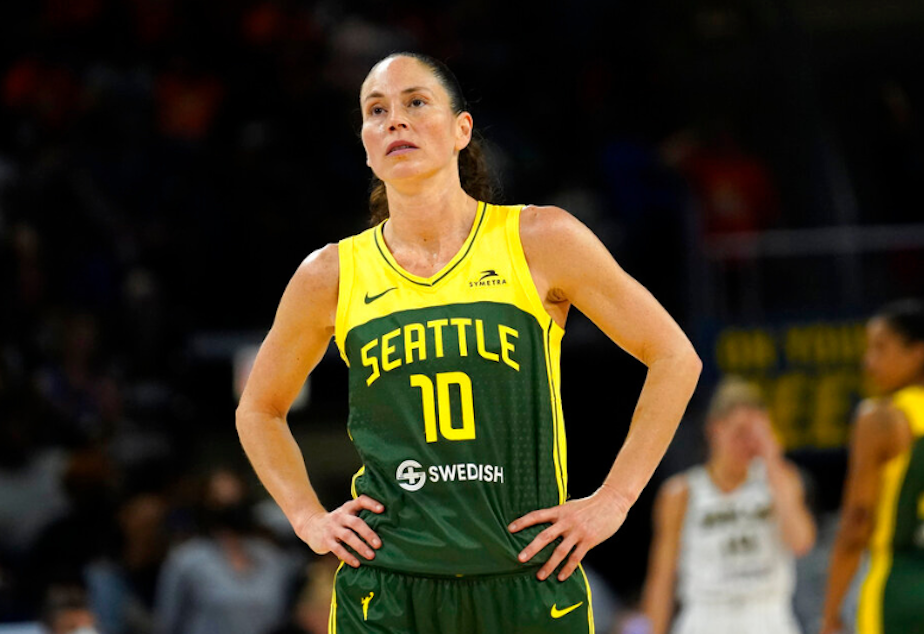 caption: Seattle Storm's Sue Bird looks at the scoreboard during a WNBA basketball game against the Chicago Sky Wednesday, July 20, 2022, in Chicago. 