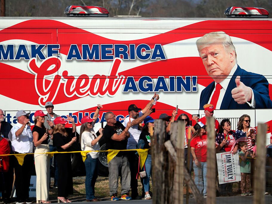 caption: People cheer for President Trump en route to his speaking engagement at the Coosa Steel Corp. on Feb. 19 in Rome, Ga. Trump delivered remarks on the economy and affordability as the state started voting to replace the seat vacated by former Republican Rep. Marjorie Taylor Greene.