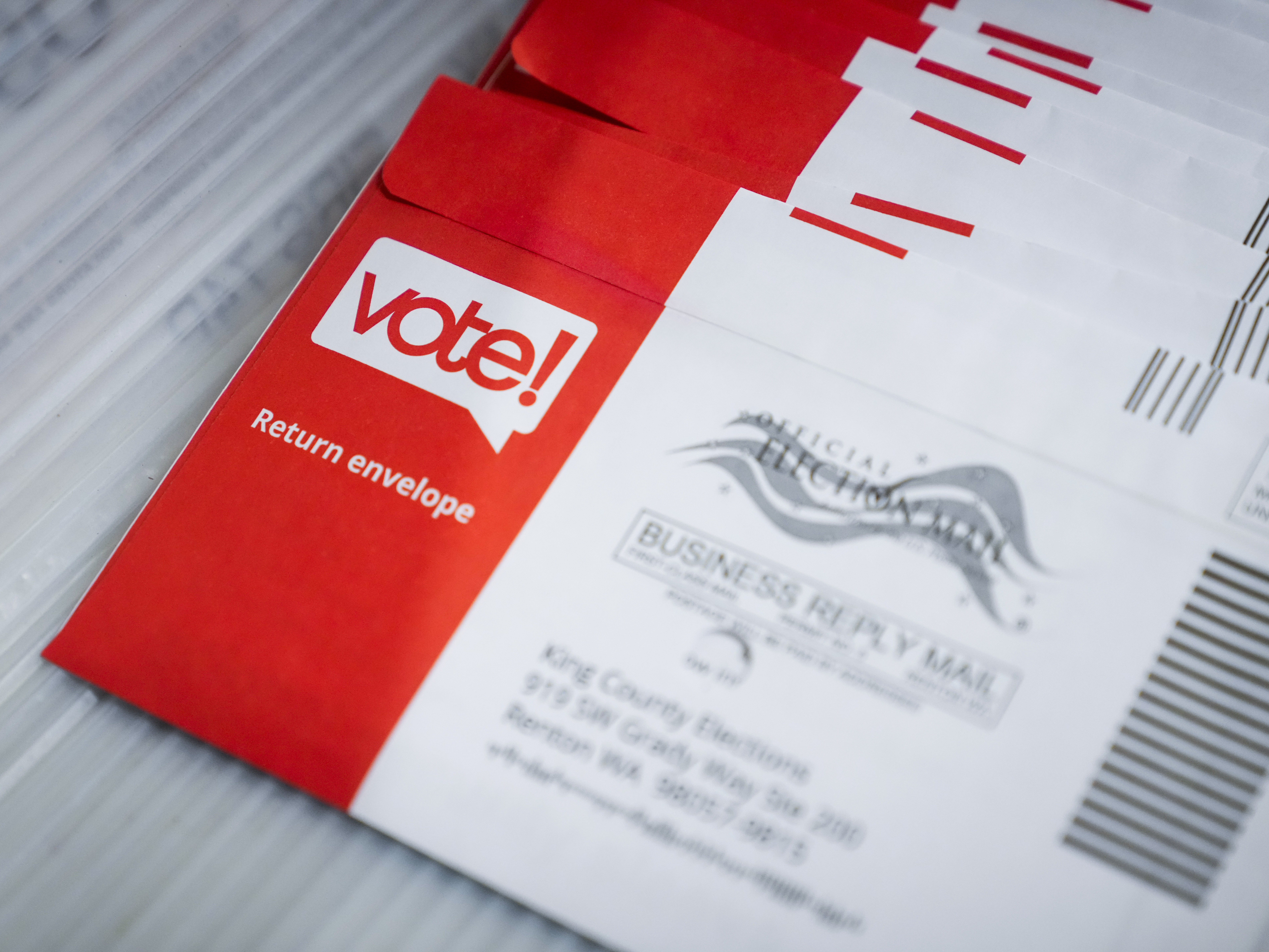 caption: A tray of mail-in ballots is seen at King County elections headquarters on Nov. 5, 2024, in Renton, Wash.