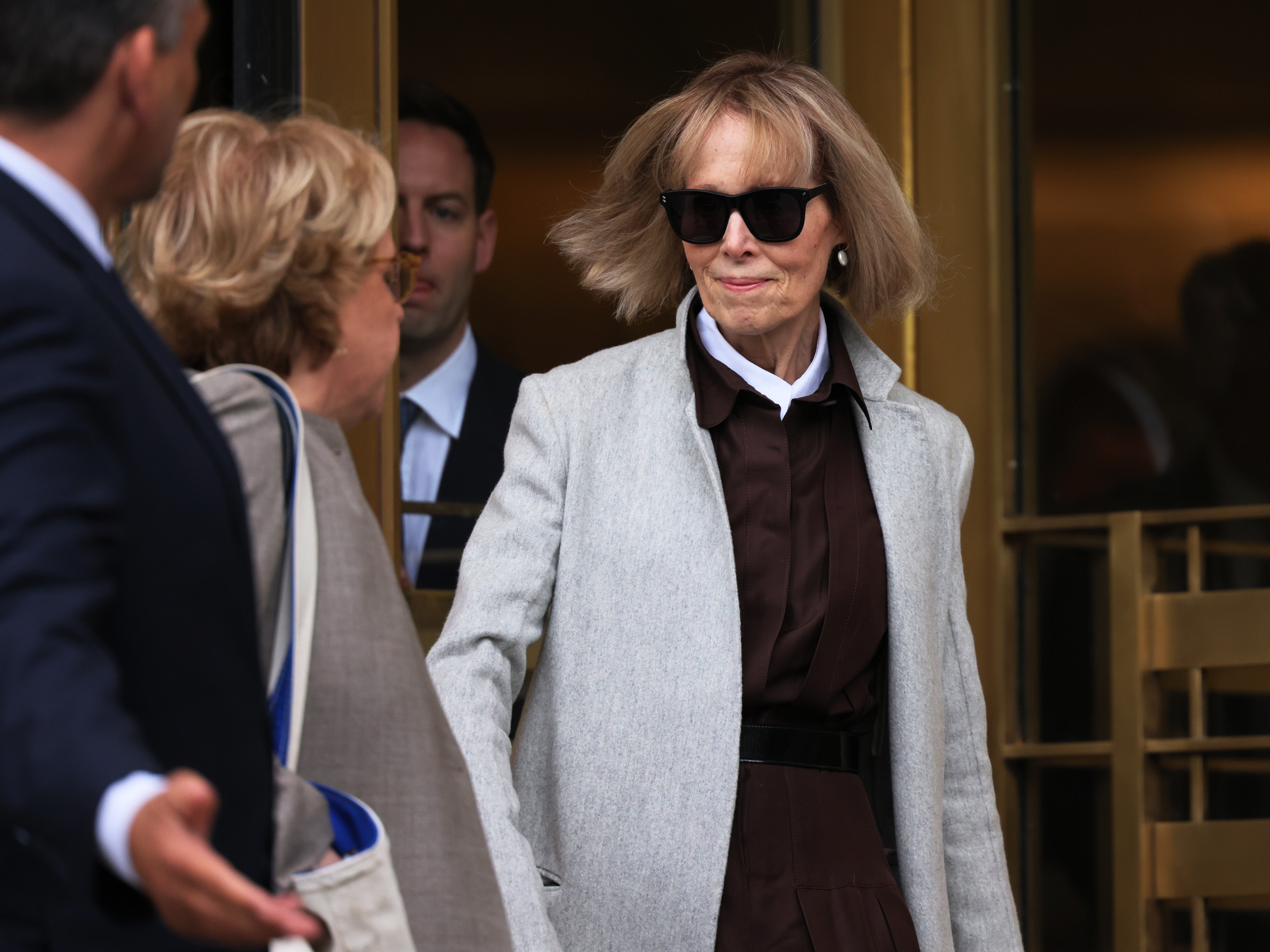 caption: A federal appeals court has rejected an appeal by Donald Trump following a 2023 jury decision that Trump sexually abused and defamed E. Jean Carroll. Carroll, right, leaves after the first day of her civil trial against the former President at Manhattan Federal Court on April 25, 2023 in New York City.