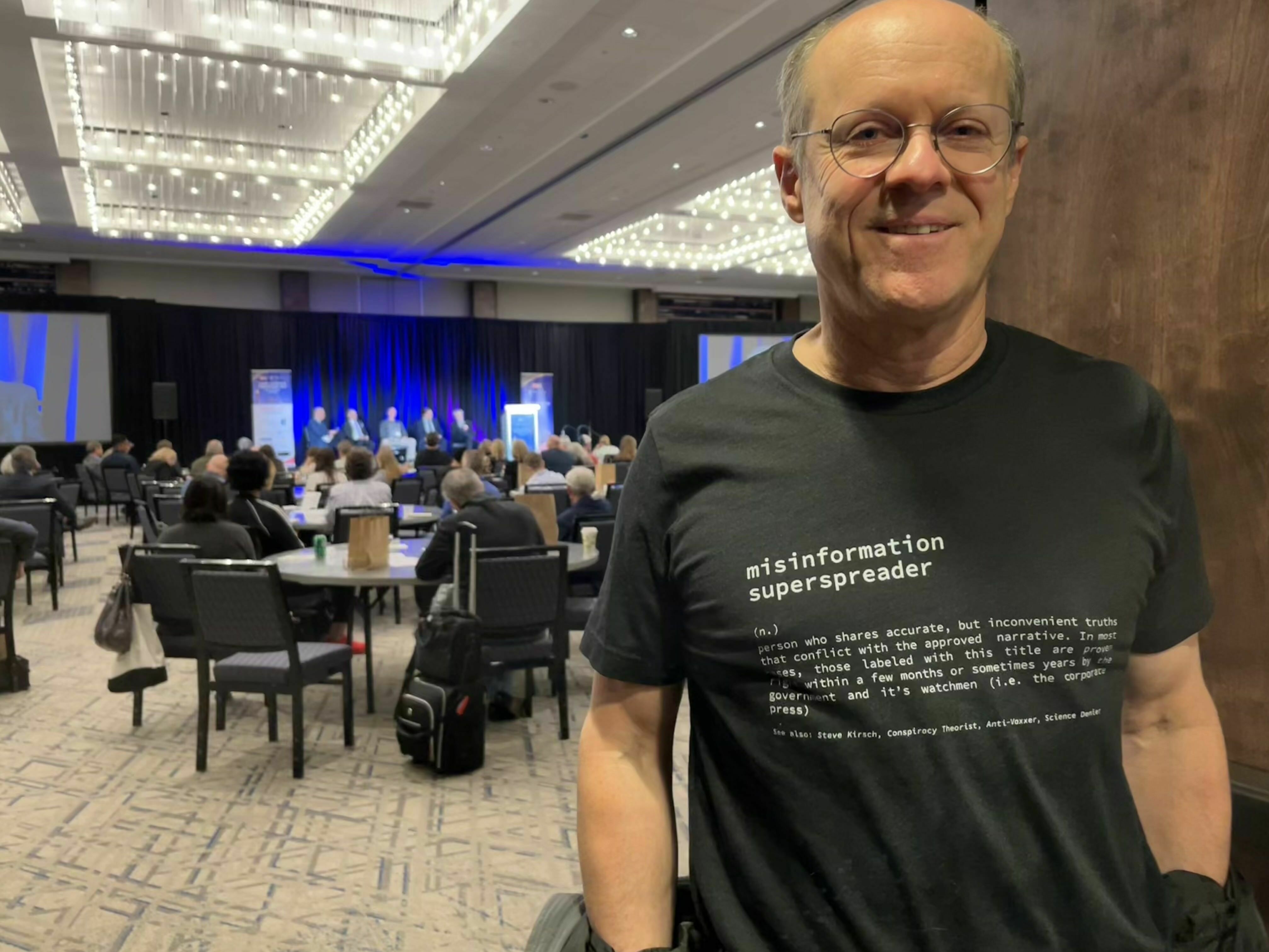 caption: Steve Kirsch, a tech entrepreneur turned anti-vaccine activist, at a conference in Atlanta for future COVID and vaccine-related litigation that he helped organize and fund.