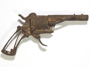 caption: This undated recent photo provided by Drouot auction house shows the revolver believed to have been used by Dutch painter Vincent Van Gogh to take his own life. The revolver has been sold at auction.