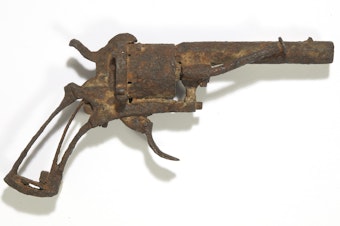 caption: This undated recent photo provided by Drouot auction house shows the revolver believed to have been used by Dutch painter Vincent Van Gogh to take his own life. The revolver has been sold at auction.