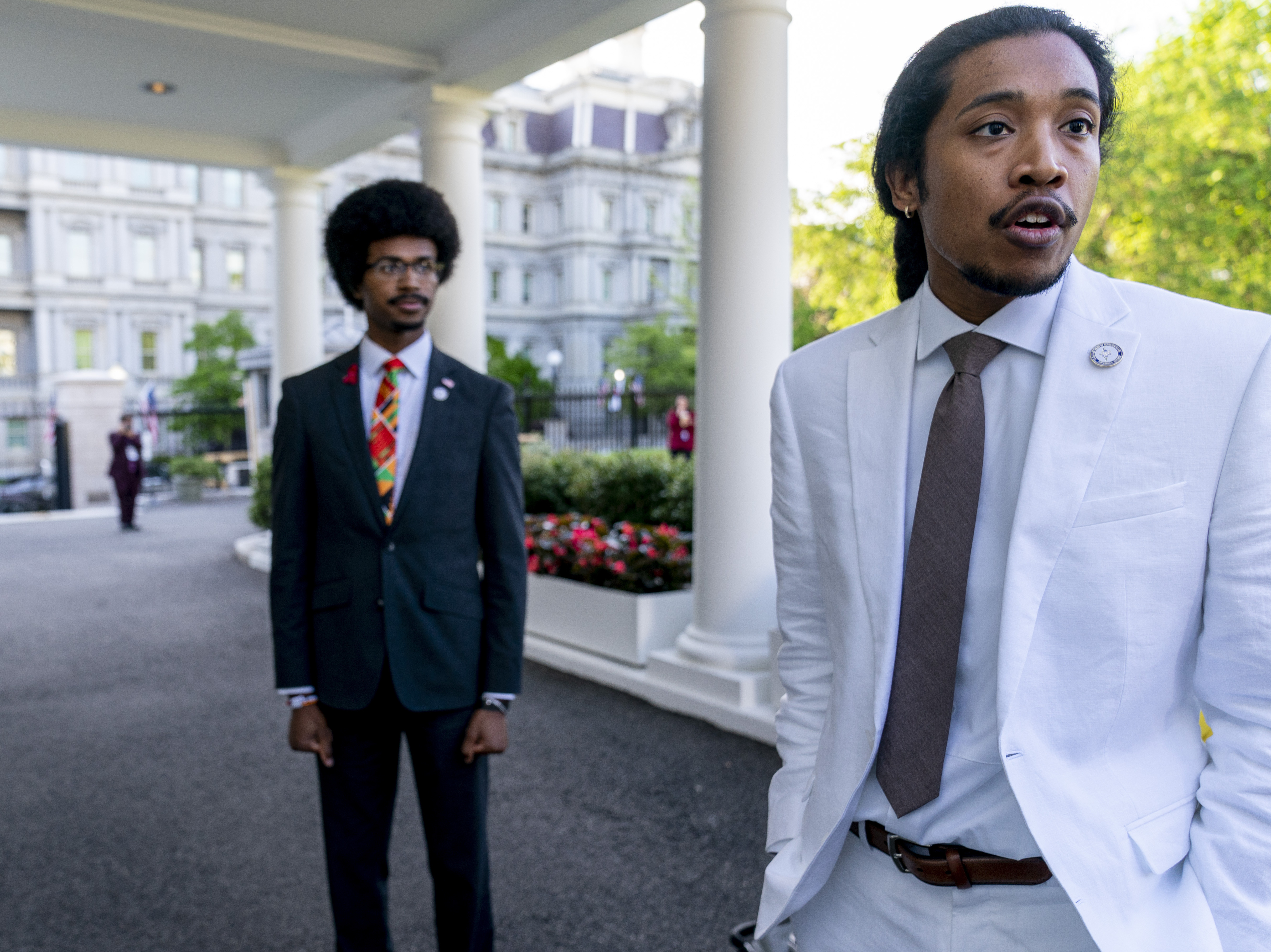 caption: Tennessee Reps. Justin Pearson, D-Memphis, left, and Justin Jones, D-Nashville, speak to reporters outside the West Wing after meeting with President Joe Biden and Vice President Kamala Harris in the Oval Office of the White House in Washington, April 24, 2023.