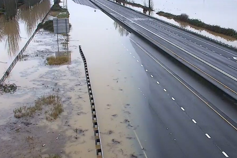 caption: A stretch of SR 167 between Auburn and Kent was closed the morning of Sunday, Dec. 14, 2025 as flood waters continued to rise in the area and cover roadways. 
