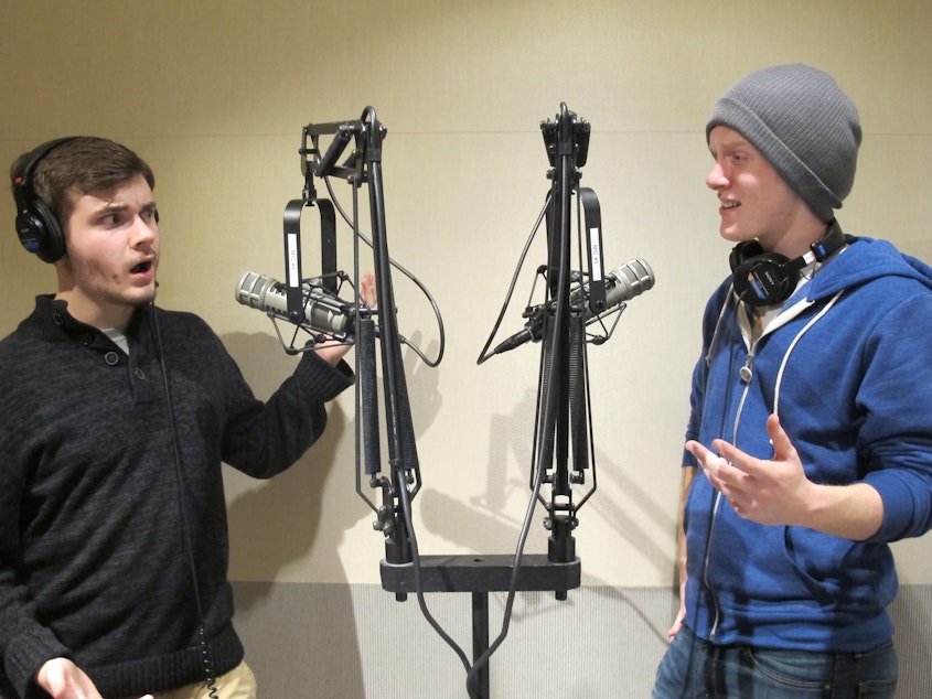 caption: Hosts Josh Medina and Walter Stanton celebrate recording this podcast.