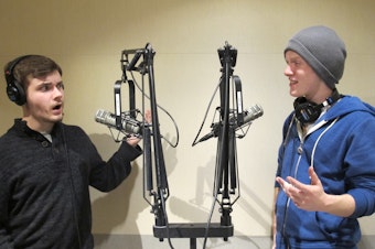 caption: Hosts Josh Medina and Walter Stanton celebrate recording this podcast.