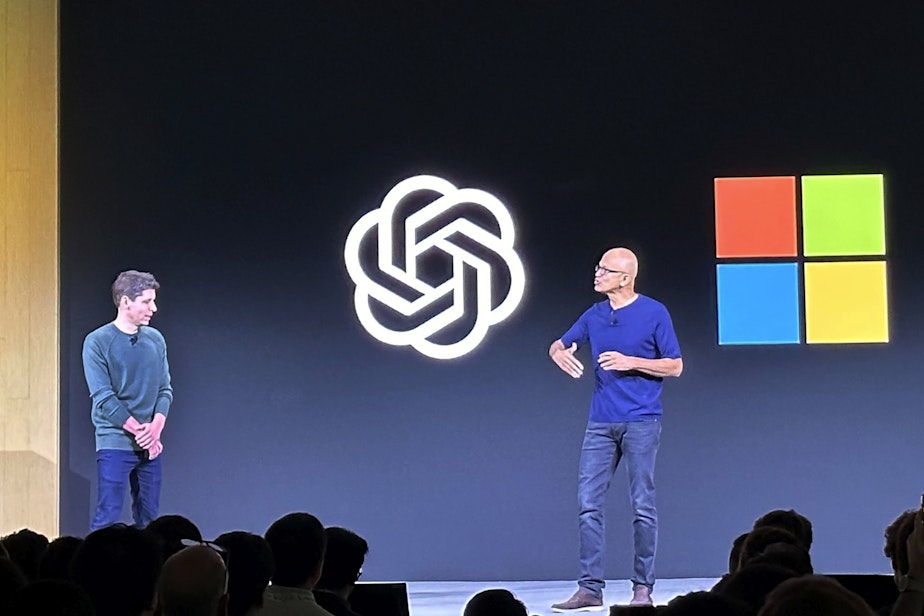caption: Sam Altman, left, appears onstage with Microsoft CEO Satya Nadella at OpenAI's first developer conference, on Nov. 6, 2023, in San Francisco. Microsoft snapped up Altman for a new venture after his sudden departure from OpenAI shocked the artificial intelligence world.