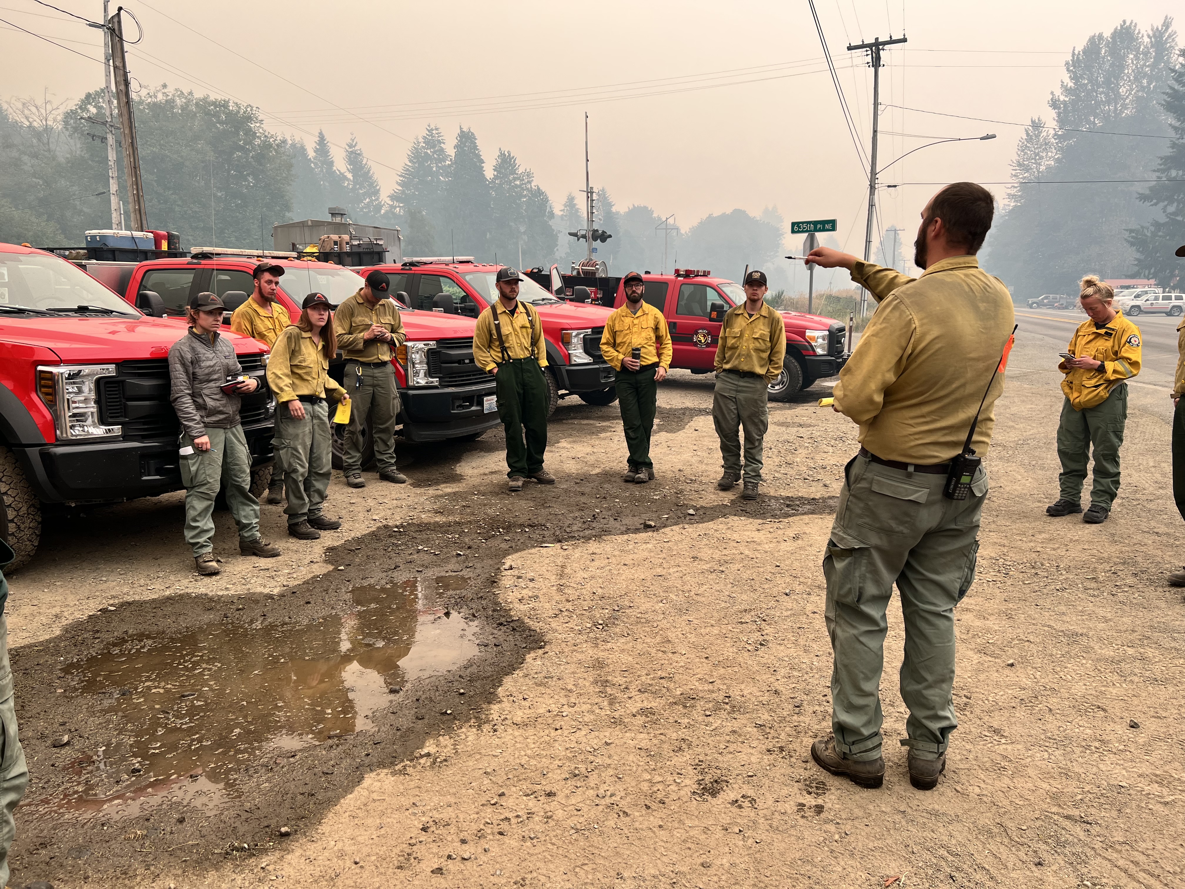 caption: Firefighters at the Bolt Creek wildfire in the Goldbar area, where residents on Saturday were encouraged to leave due to increasing wildfire smoke.