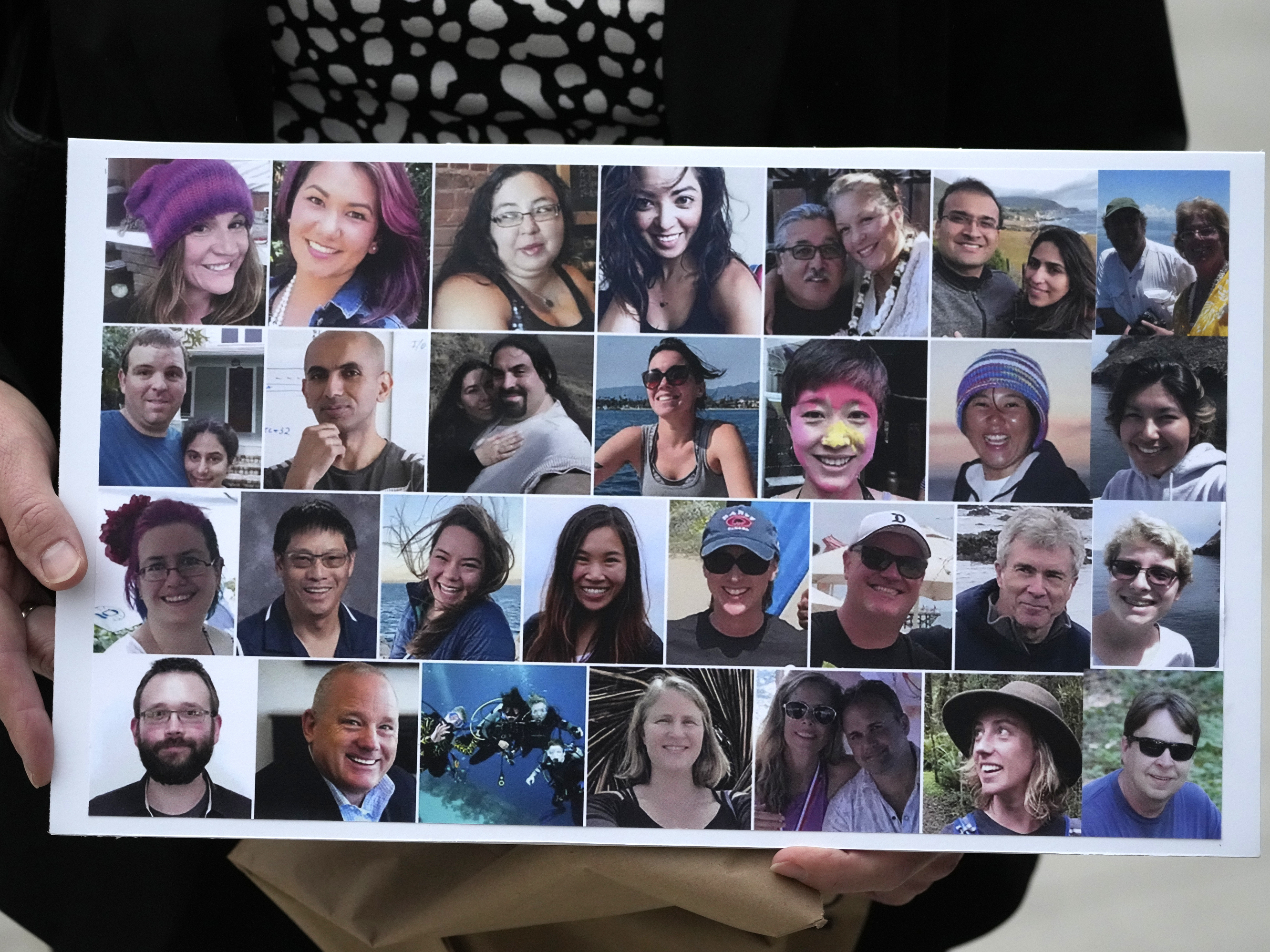 caption: A photo collage of the 34 victims of the Sept. 2, 2019 fire aboard the dive boat, Conception, at Santa Cruz Island, is held by a family member arriving at federal court in Los Angeles, Wednesday, Oct. 25, 2023.