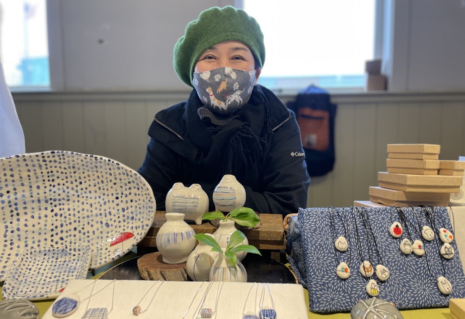 caption: Mutsuko Mitsui, of Flyingcat Creations, has been having her best year ever at the Pike Place Market