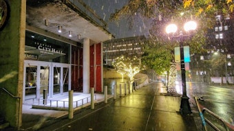 caption: Seattle City Hall during snowfall on Thursday, Jan. 11, 2024. 