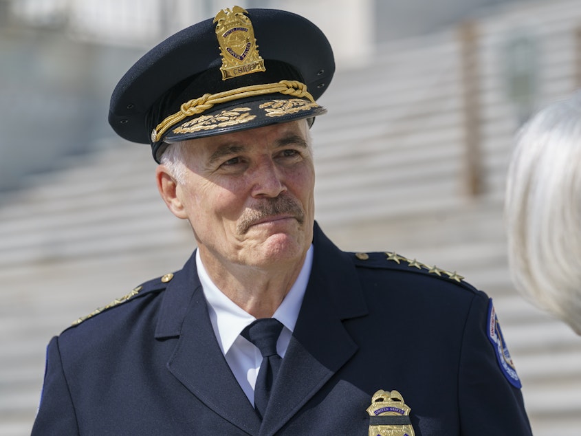 caption: Tom Manger, a veteran police chief of departments in the Washington, D.C., region, is seen Friday as he takes over the United States Capitol Police.