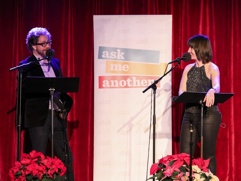 caption: In a game called Fact Bag, Jonathan Coulton and Ophira Eisenberg discuss facts pulled from a bag.