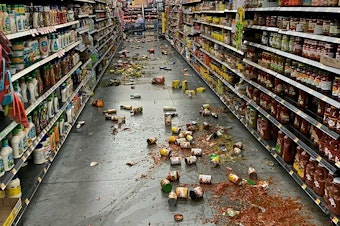 caption: Food that fell from the shelves at a Walmart following an earthquake in Yucca Yalley, Calif., on Friday.