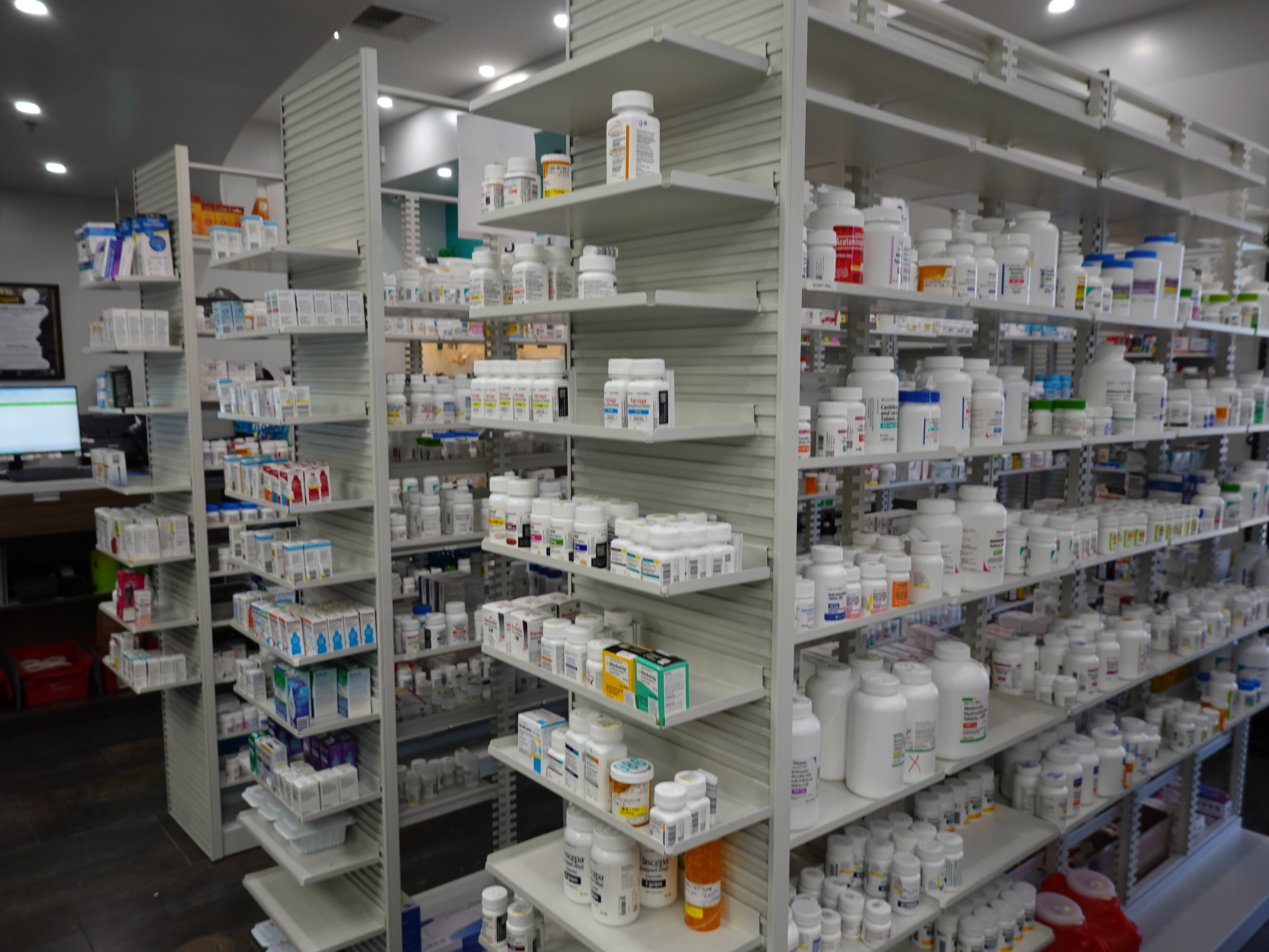 caption: Prescription drugs sit ready to be distributed to patients at 986 Pharmacy, an independent pharmacy in Alhambra, Calif.