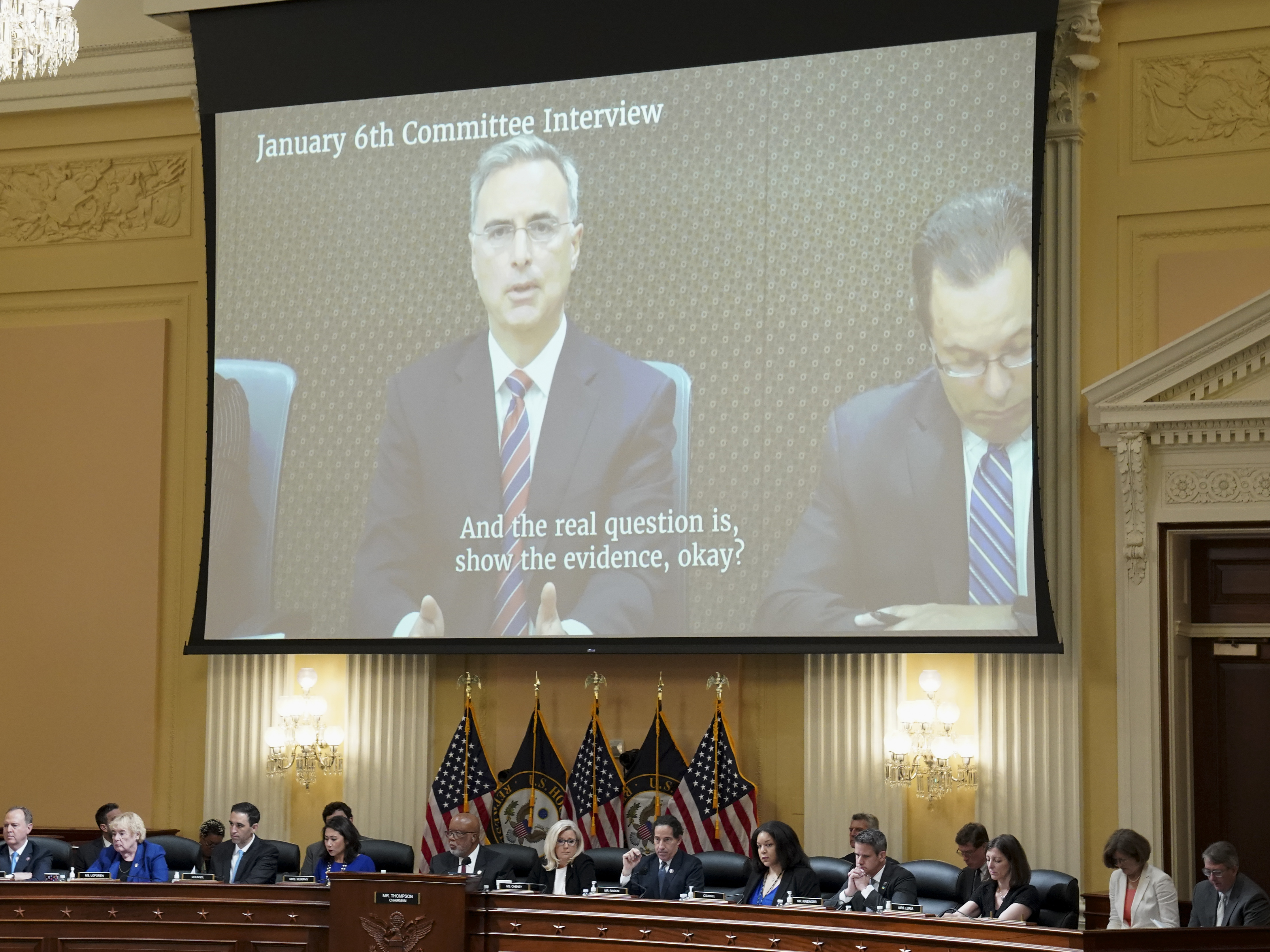 caption: Former White House counsel Pat Cipollone is seen on a video display during the seventh hearing held by the House Jan. 6 committee on Tuesday.