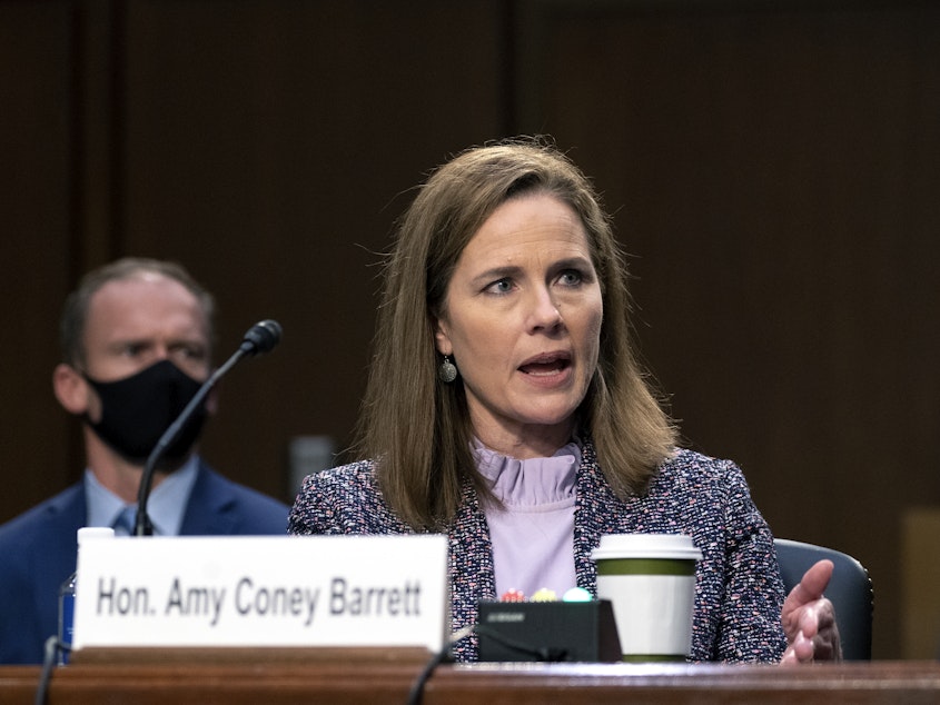 caption: The Senate voted Monday evening on the Supreme Court nomination of Judge Amy Coney Barrett, seen here during her confirmation hearings.