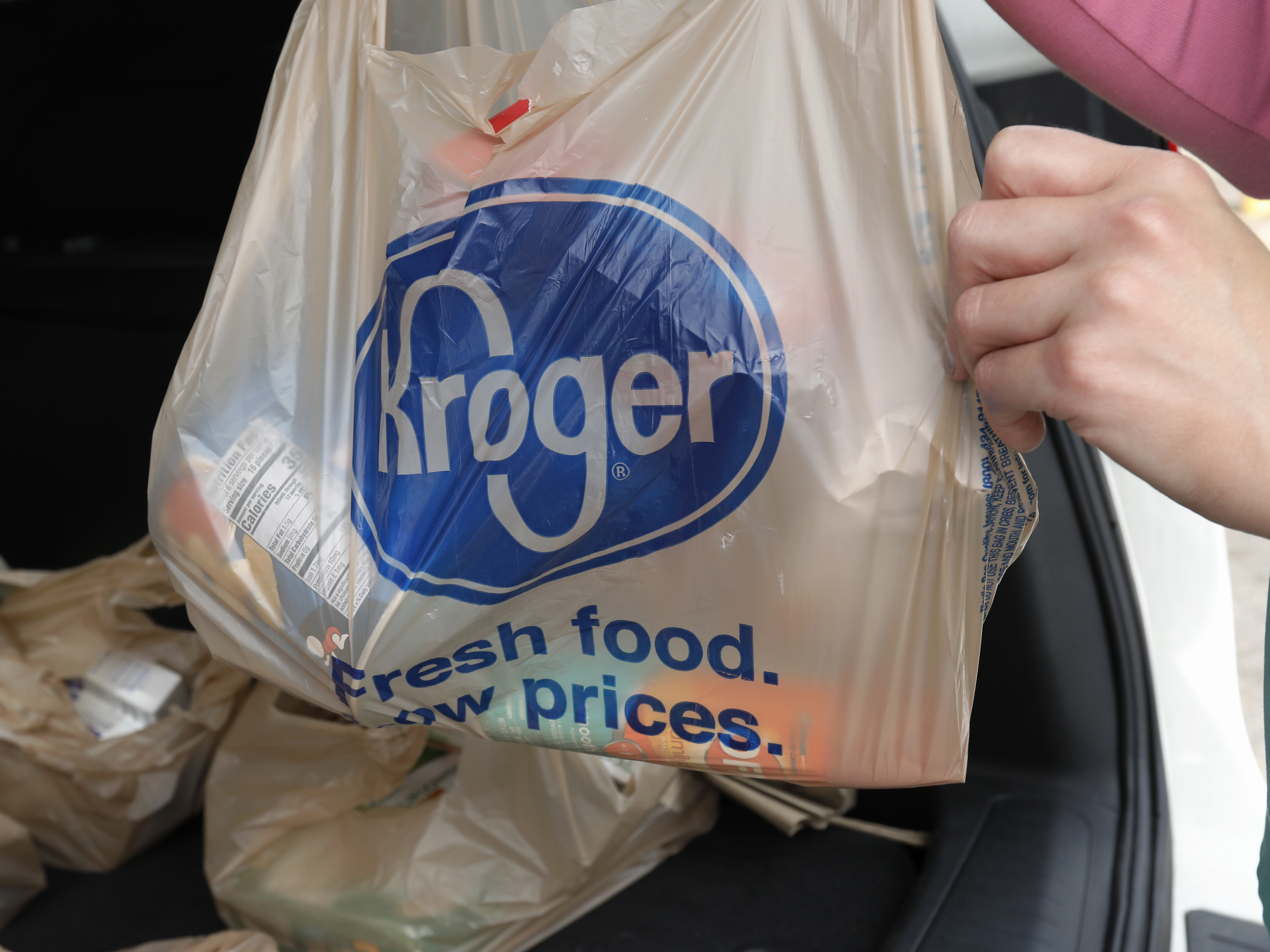 caption: Kroger and the food workers union want grocery staff to be designated as first responders in the coronavirus pandemic.