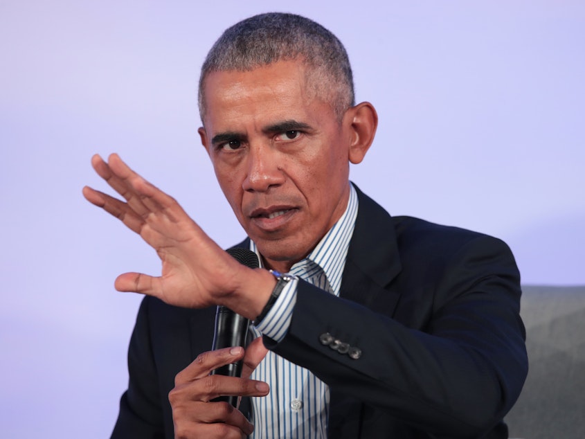caption: Former President Barack Obama, here at a Chicago event in October, has weighed in on the aftermath of George Floyd's killing, saying those who've resorted to violence put "innocent people at risk."