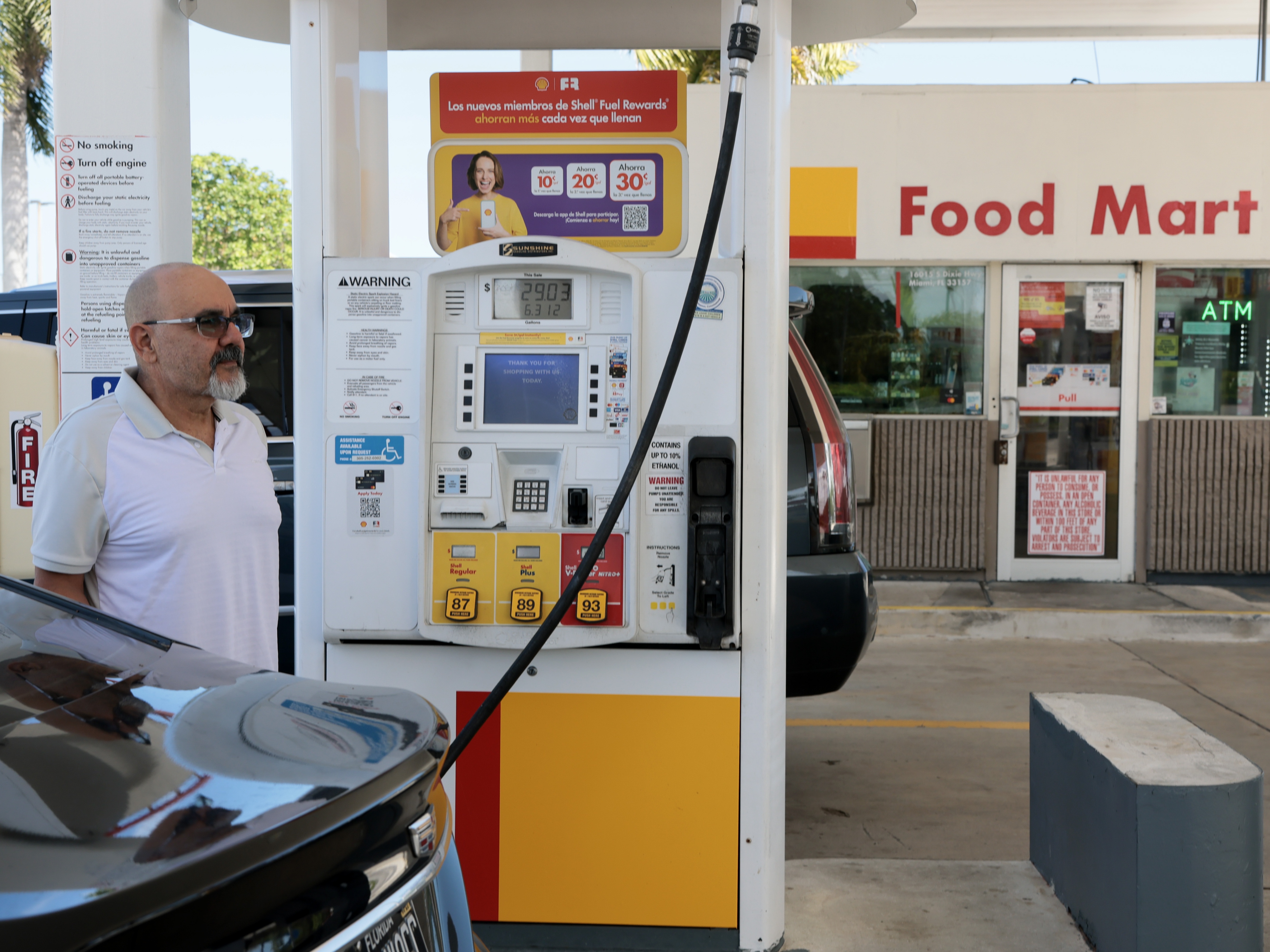 caption: Soaring gasoline prices have done little to dampen consumer spending. The Commerce Department reported solid economic growth during the first three months of the year.