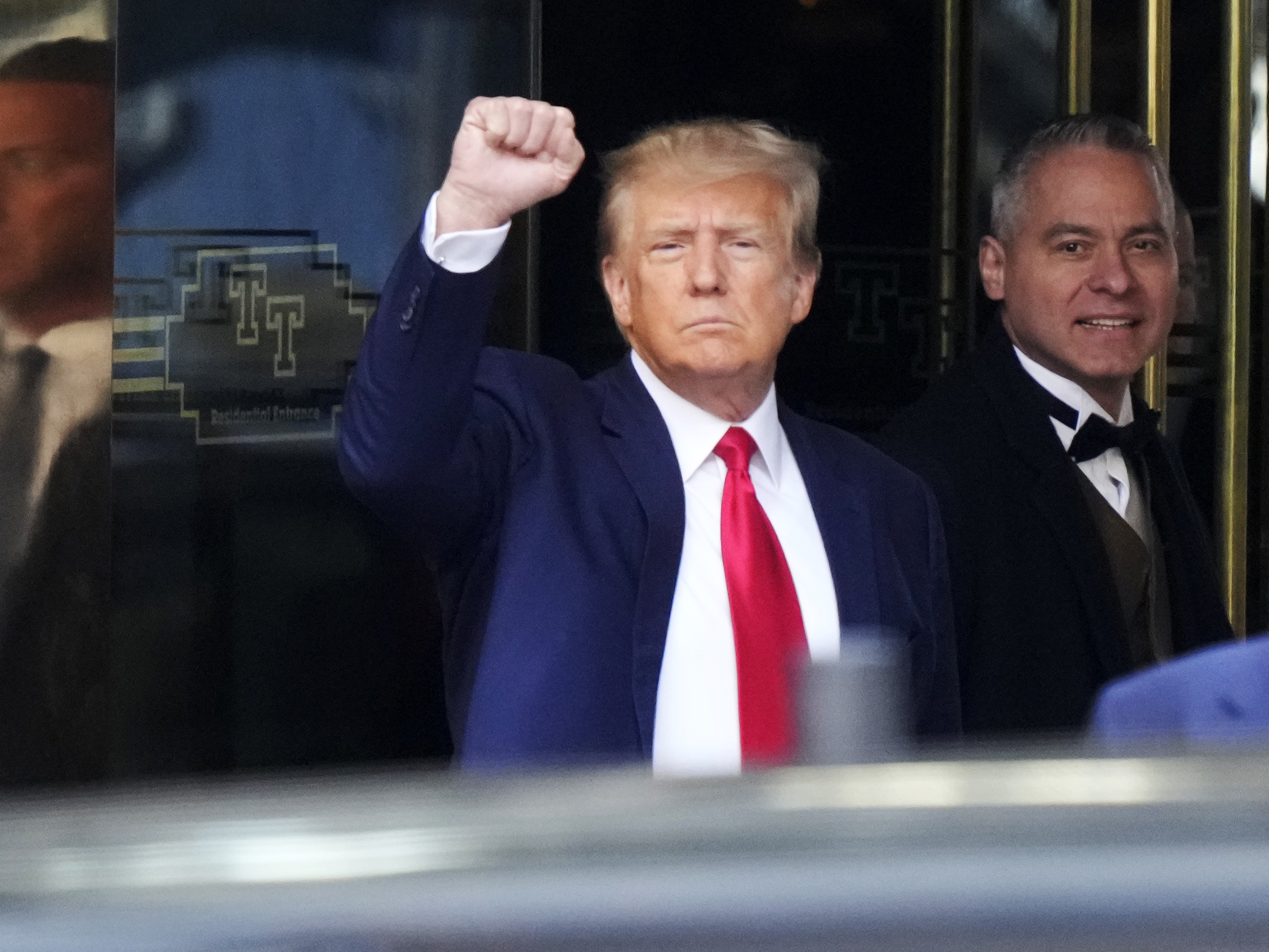 caption: Donald Trump leaves Trump Tower in New York on Tuesday.