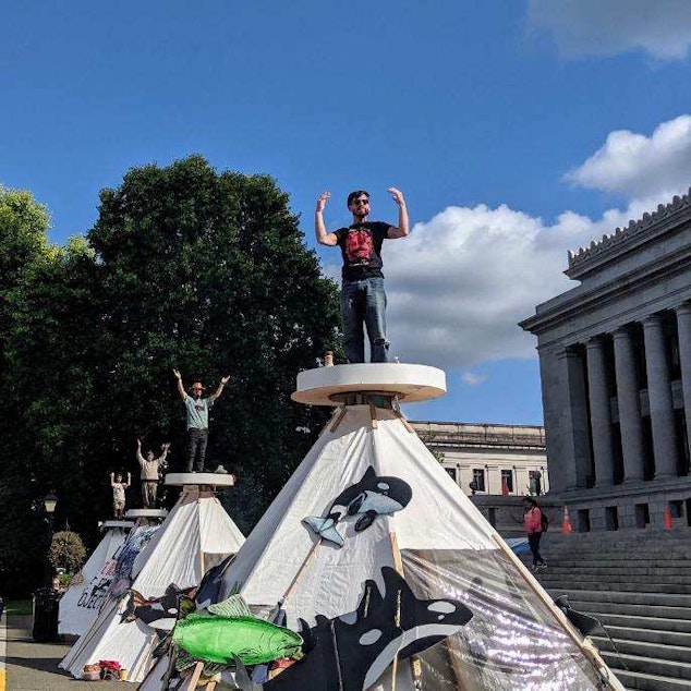 caption: Indigenous climate activists led by Protectors of the Salish Sea set up tepees at Washington state's capitol Tuesday, September 24th 2019.