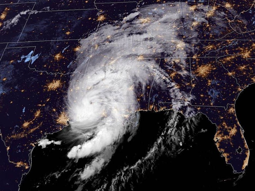 caption: Hurricane Laura's arrival at the Louisiana coast early Thursday prompted the National Hurricane Center to warn: "Take action now to protect your life!