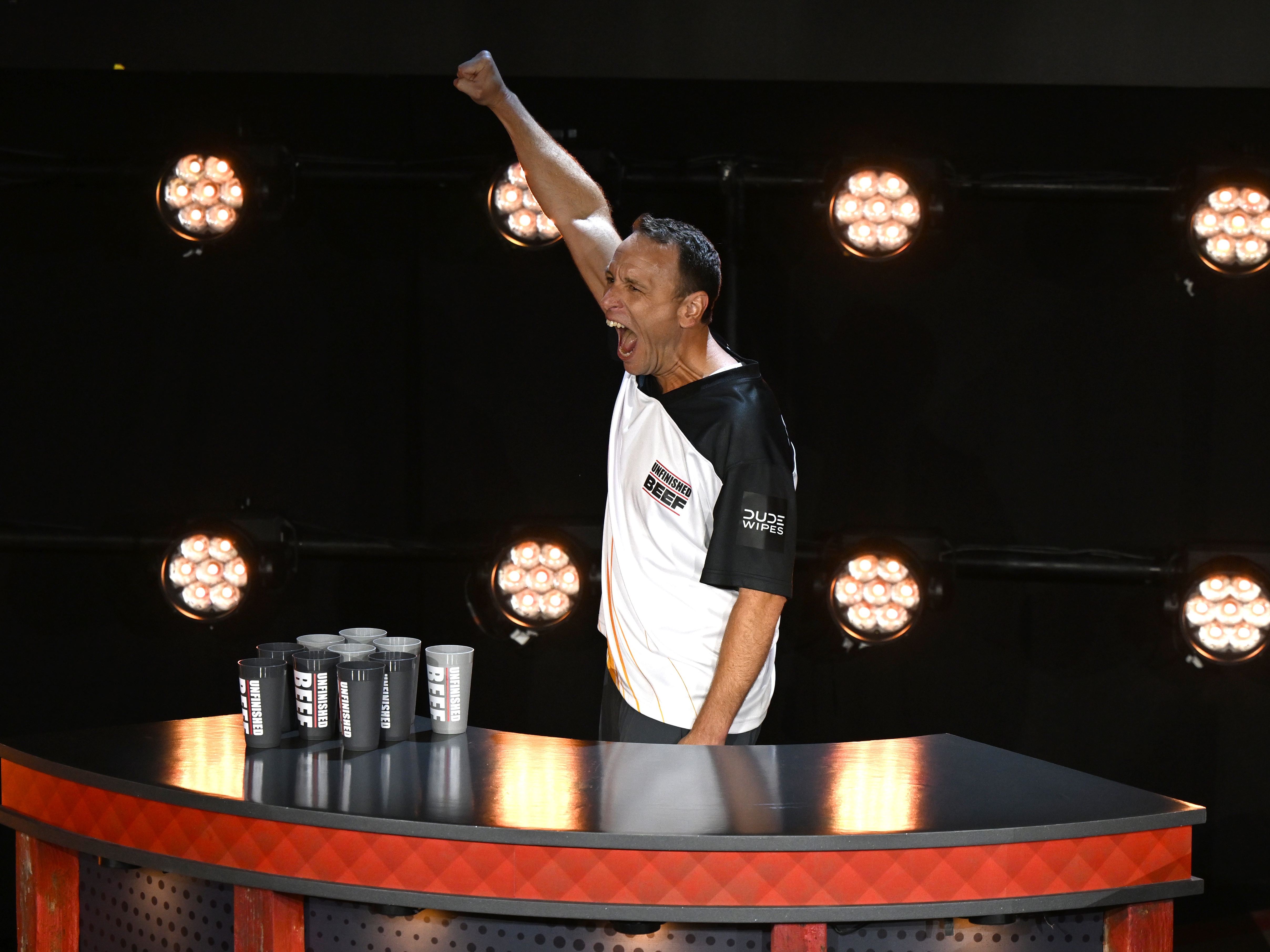 caption: Joey Chestnut ate 83 hot dogs and buns in 10 minutes onstage in Las Vegas for a live Netflix event on Monday. His longtime rival, Takeru Kobayashi, ate 66. 