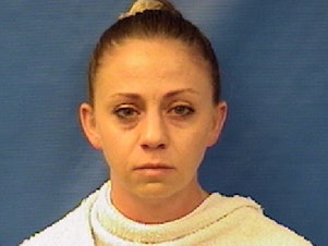 caption: Dallas police Officer Amber Renee Guyger, seen here in a photo provided by the Kaufman County Sheriff's Office, was arrested Sunday on a manslaughter warrant in the shooting death of a black man in his home.