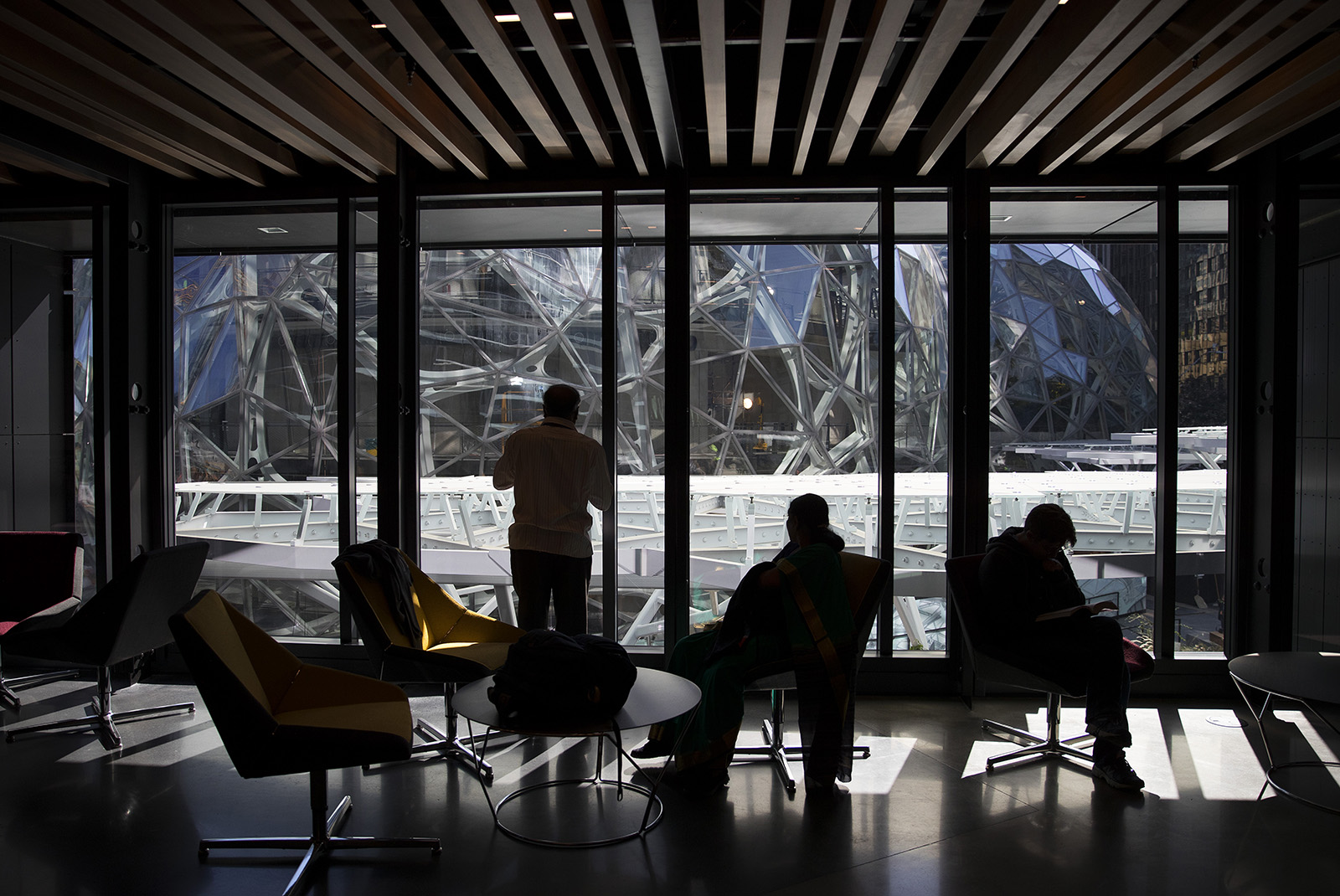 caption: Amazon.com is still building its first headquarters in Seattle while searching for a second headquarters location elsewhere in North America.